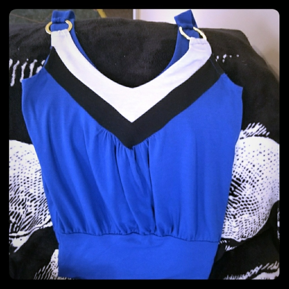 Blue tunic top with gold hardwear